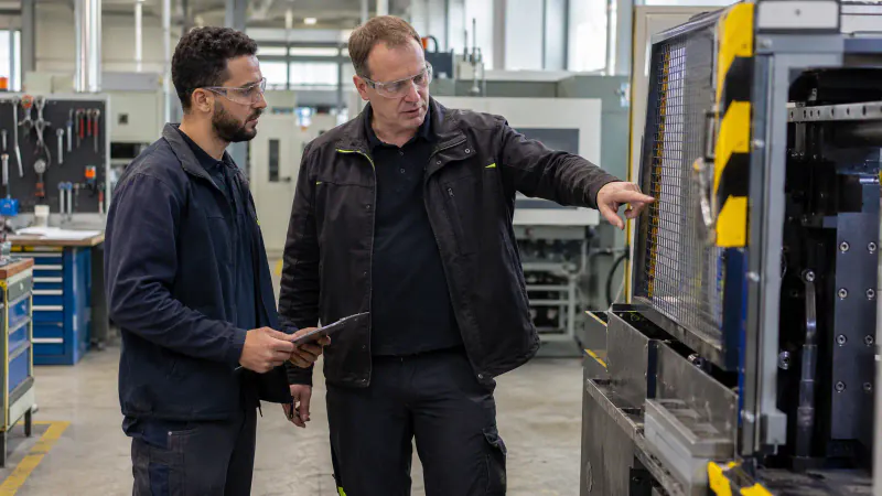 International skilled worker on a supported first day at work